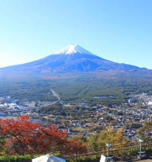 a view of a mountain with a city