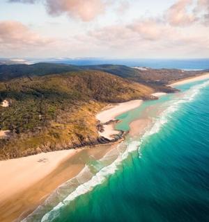 an aerial view of a beach and the ocean