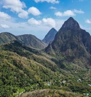 an aerial view of the mountains and the ocean