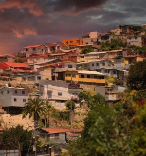 a group of houses on top of a hill