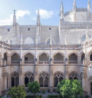 a large building with a cathedral in the background