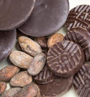 a pile of chocolate candies and rocks on a table