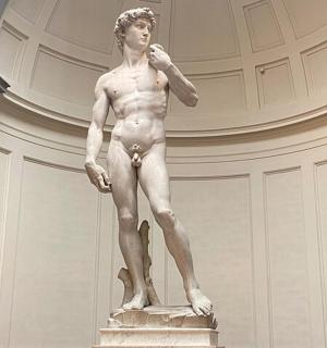 a statue of a man standing in a building