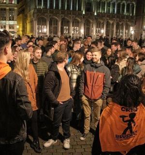 a large group of people standing in a crowd