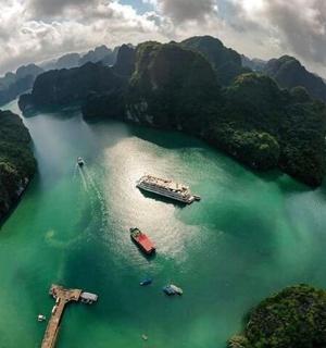 an aerial view of a bay with boats in the water
