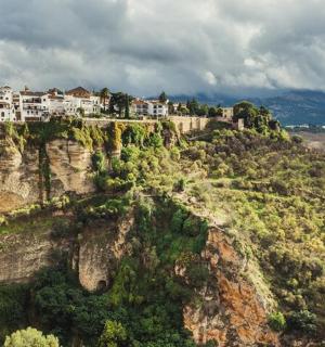 a mountain with houses on top of it