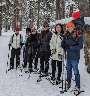 a group of people on skis in the snow