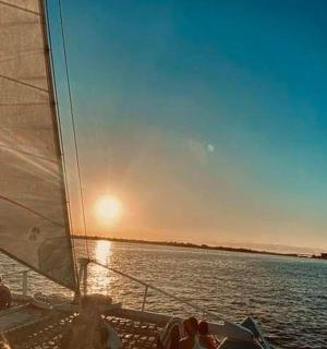a group of people on a boat in the water