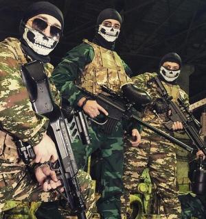 a group of soldiers wearing gas masks and guns