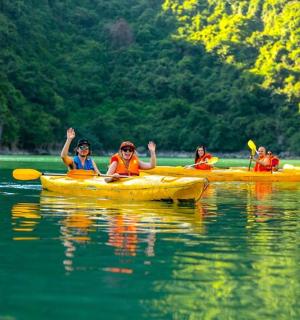 a group of people in kayaks on a lake
