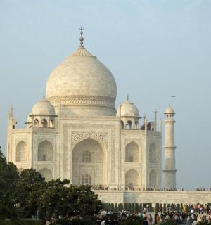 a large white building with two domes
