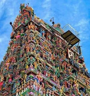 a tall tower with a clock on top of it