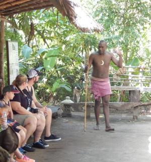 a man standing in front of a group of people