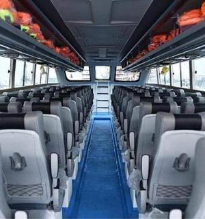 a bus with empty seats on a bus