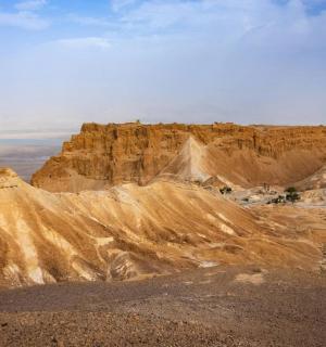 a view of a mountain in the desert