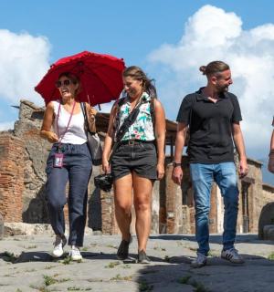 a group of women walking down a street