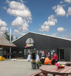 a group of people standing in front of a building