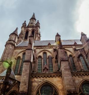 an old building with a clock tower on top of it