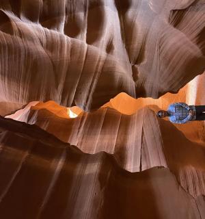 a water bottle in a slot canyon