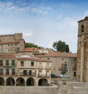 a group of buildings with a clock tower