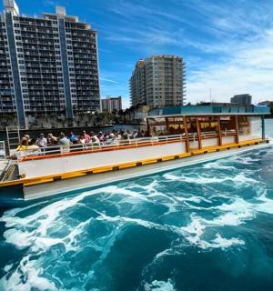 a boat in the water with people on it