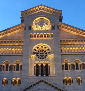a large building with lights on top of it