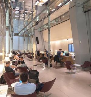 a group of people sitting in chairs in a building