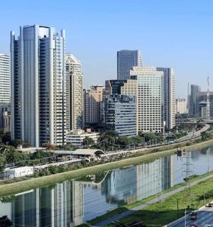 a view of a city with a river and buildings