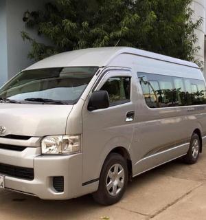 a white van parked in front of a house