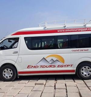 a white van parked in a parking lot