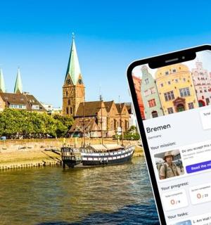 一部手机在一条河和一座城市前