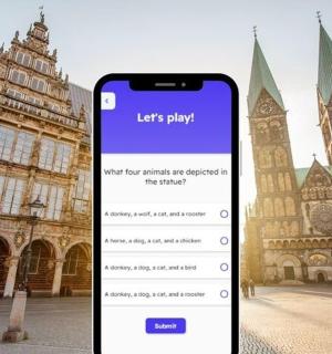 an iphone with a list play on it in front of a building