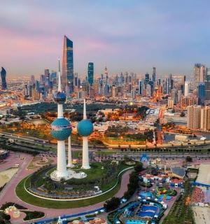 an aerial view of a city with a large city