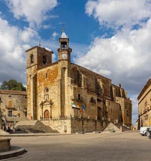 an old building with a clock tower on top of it