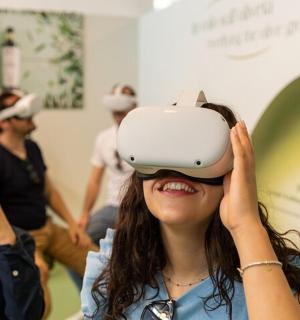 a woman wearing virtual reality goggles on her head