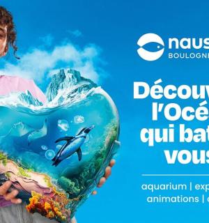 a young girl holding a heart shaped aquarium aquarium in her hands