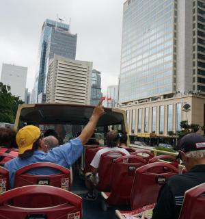 a group of people riding on a tram
