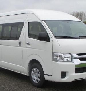 a white van parked on the side of a road