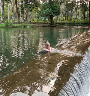 a person swimming in a body of water