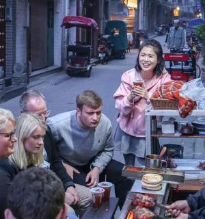 a group of people sitting around a table