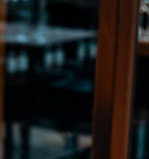 a close up of a glass door in a room