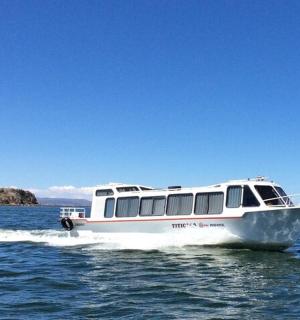 a white boat in the water on the water