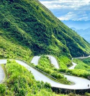 a winding road on the side of a mountain