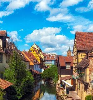 a view of a river in a city with buildings