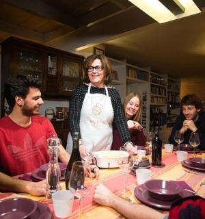 a group of people sitting around a table