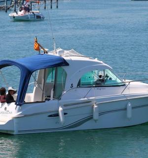 two people on a boat in the water