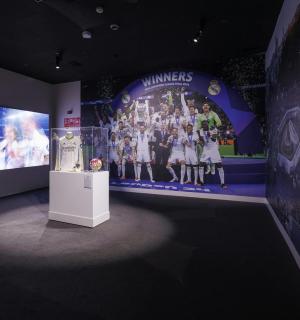 a room with a wall with a picture of the winning team