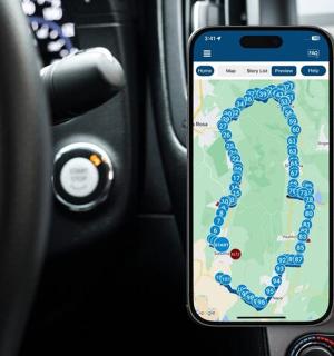 a cell phone in a car with a map