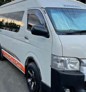 a white van parked on the side of a street