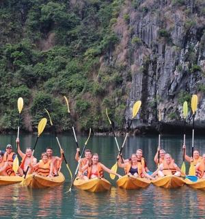 a group of people in kayaks in the water